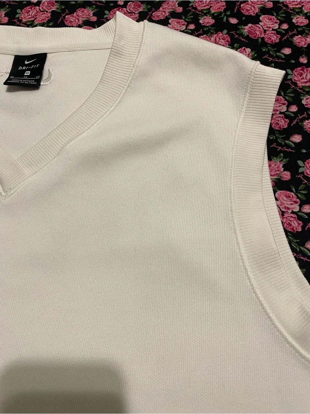 Nike Cream V‑Neck Sleeveless Knit Top Golfing